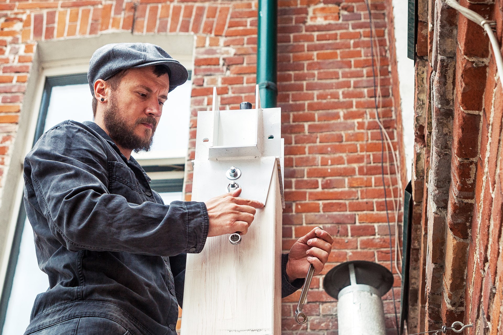 Man retrofitting a property in West Yorkshire